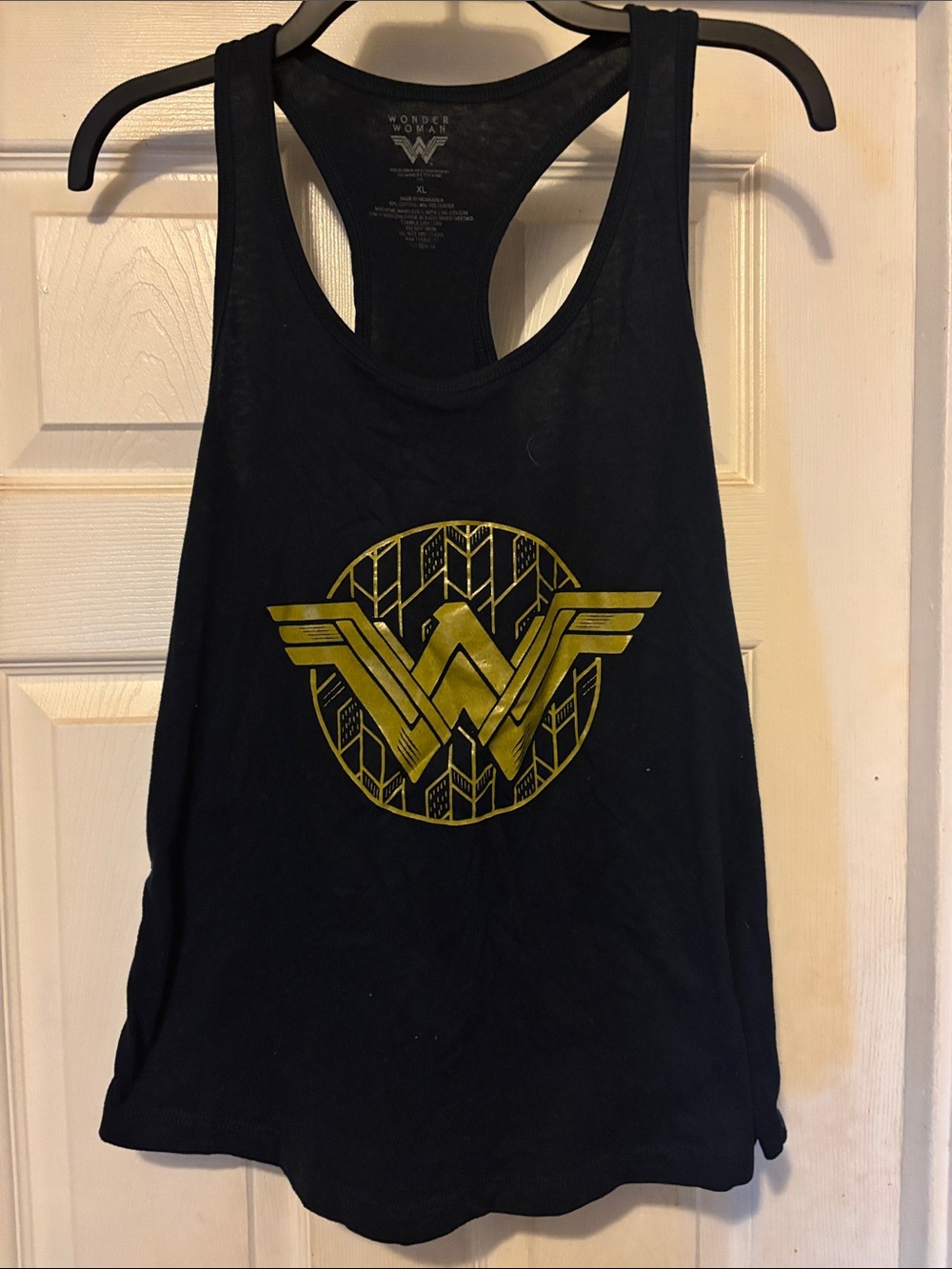 Wonder Woman Black Racerback Tank with Gold Emblem. This is a Size XL.  P/Z